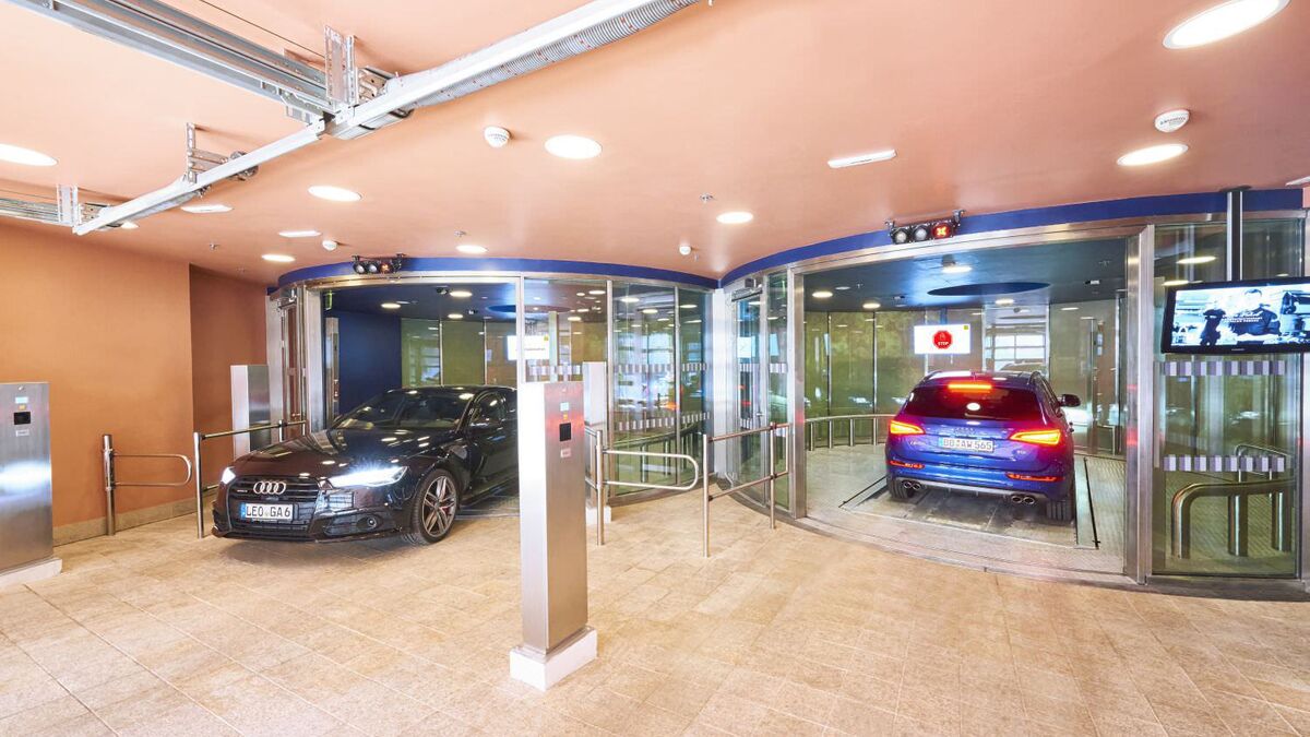 A car drives into an automated parking system