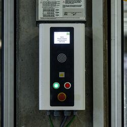 The image shows a control panel of a parking system.
