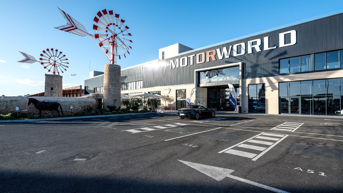 Exterior view of Motorworld Mallorca with the car park in front